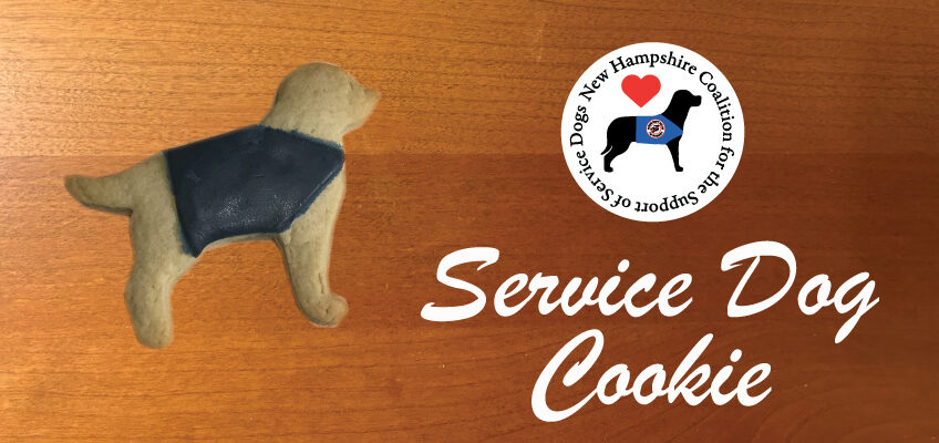 Service Dog Cookie and NHCSSD logo on a wooden cutting board