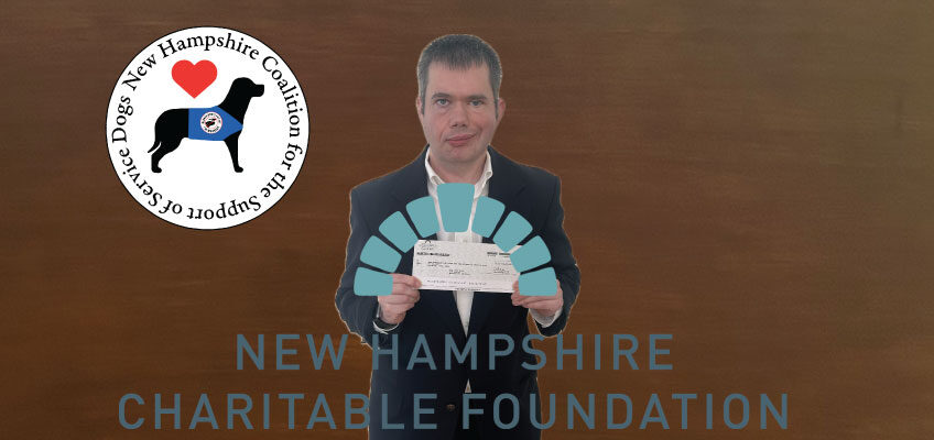 NHCSSD logo and man holding grant check