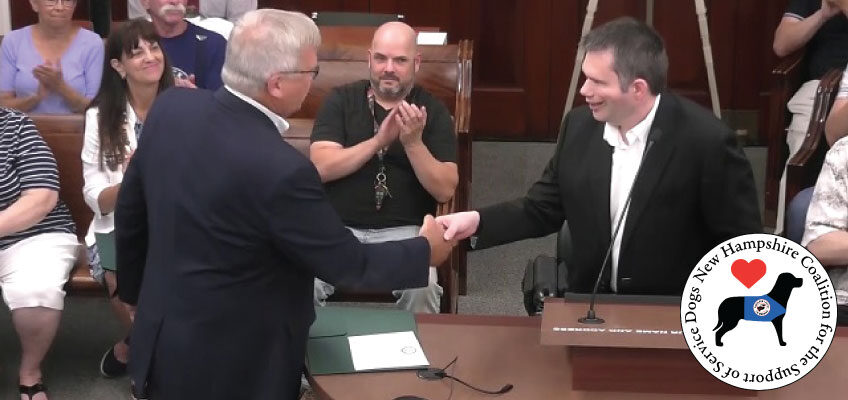 Brendan Madden accepts proclamation at Dover City Hall