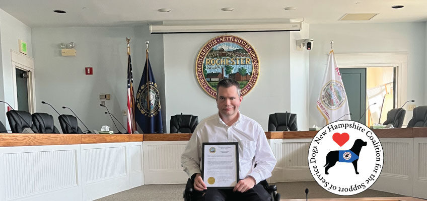 Brendan Madden with the proclamation in the Rochester city council chambers