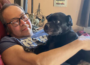 The artist and his dog (John Patterson and Bear)